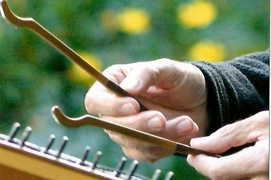 playing the hammered dulcimer
