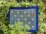 Blue quilt with yellow stars
